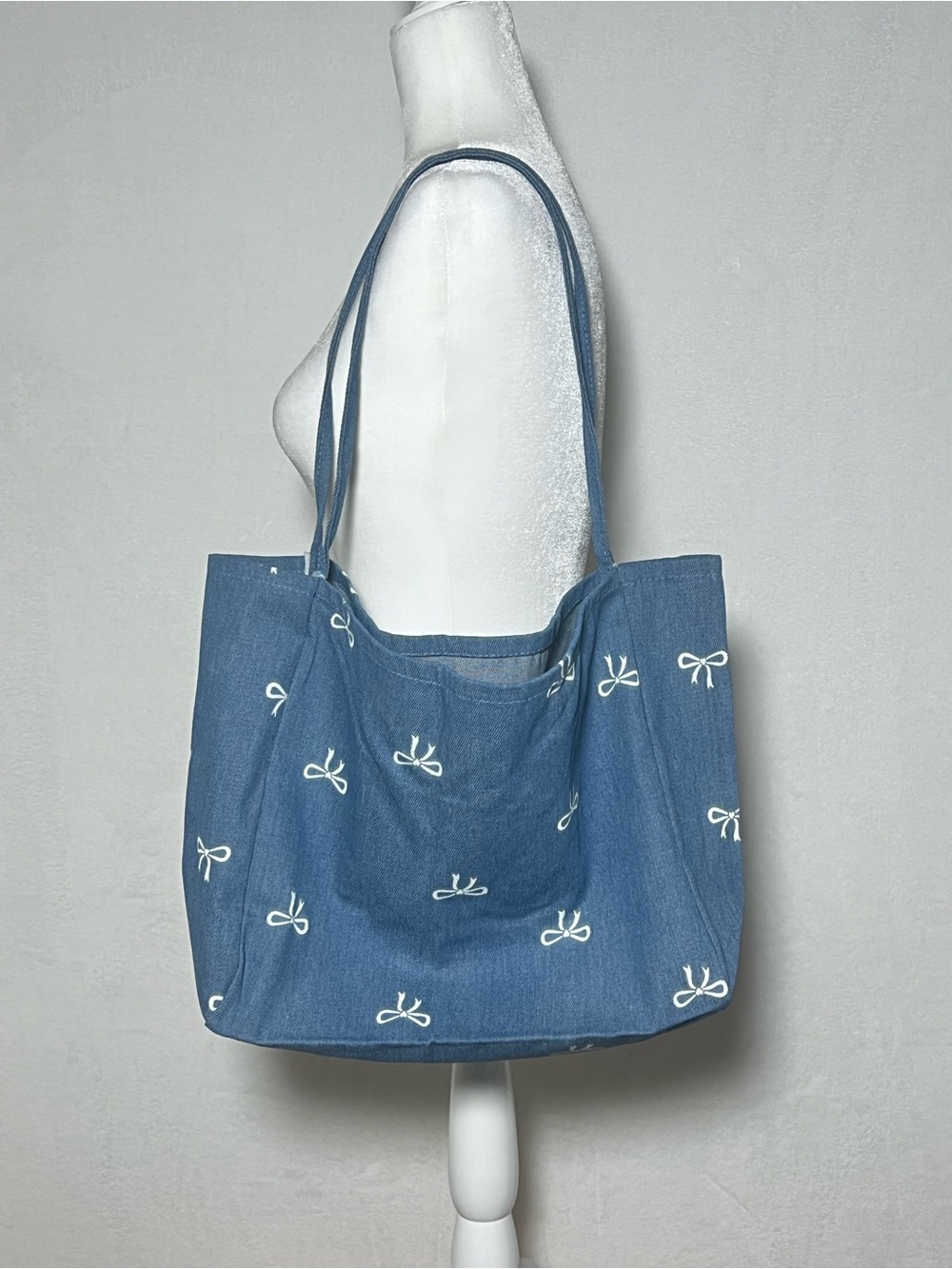 NWOT Denim Blue Tote Bag with White Bow Print